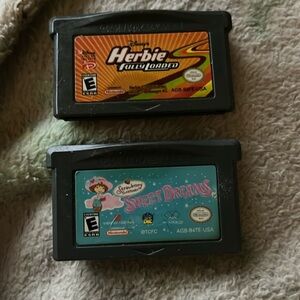 Lot of 2 gambit advanced games strawberry shortcake and herbie fully loadeded